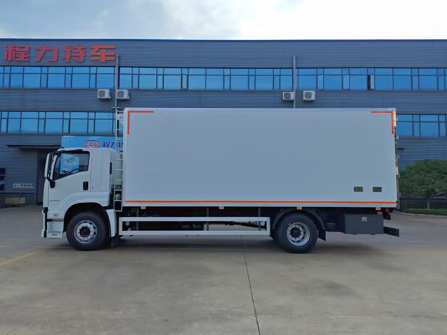 Side view of ISUZU GIGA reefer truck with fiberglass insulated cargo box