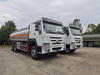 Howo 6x4 refueling truck delivering diesel fuel at construction site
